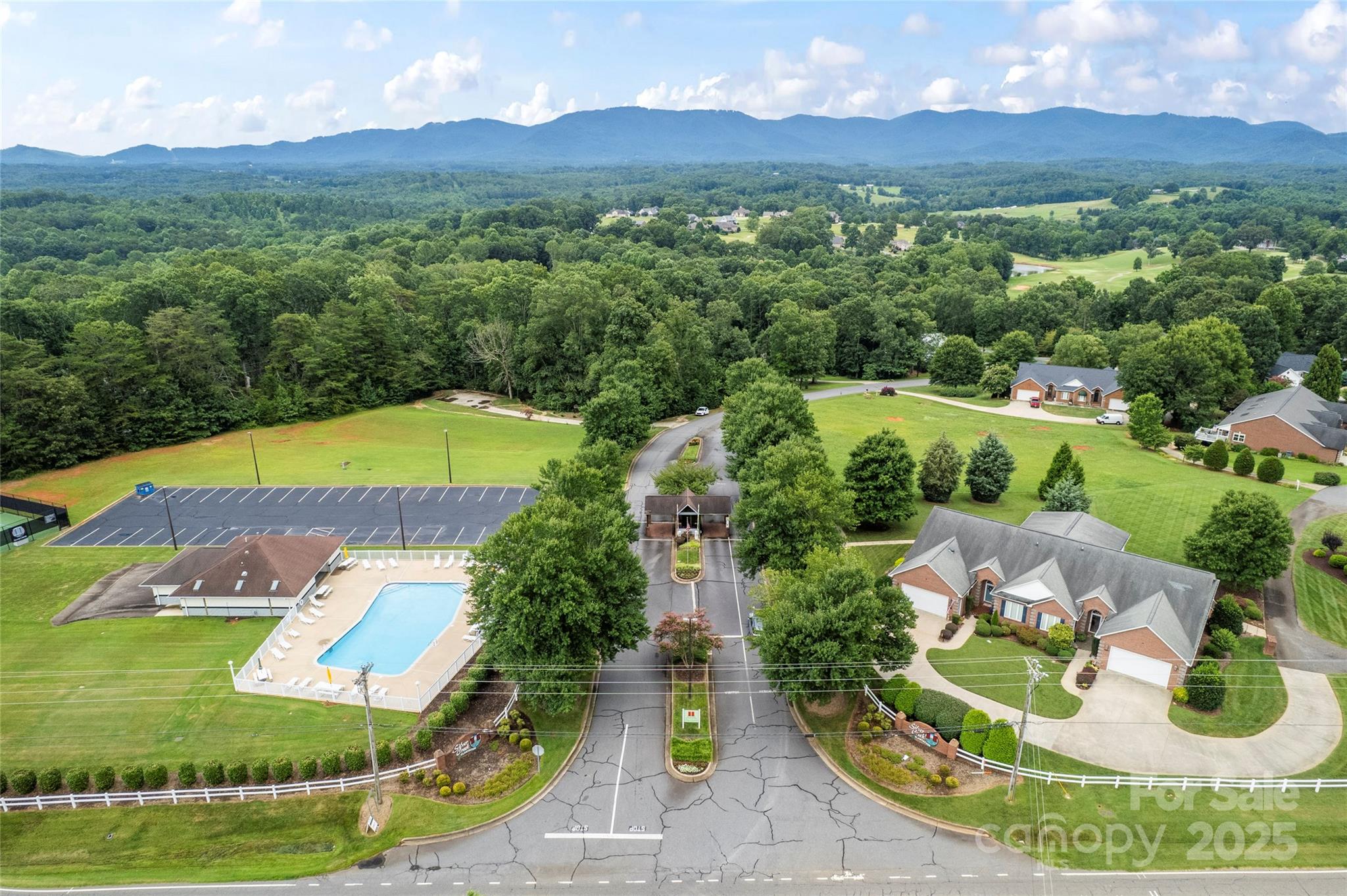 3615 Cornwell Court, Unit 149 Morganton, NC 28655 - Photo 20 of 20 a view of a swimming pool with a yard and plants