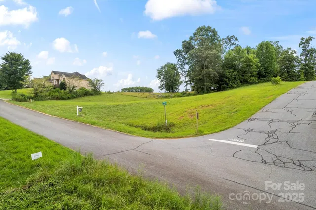 a view of a golf course with a lake