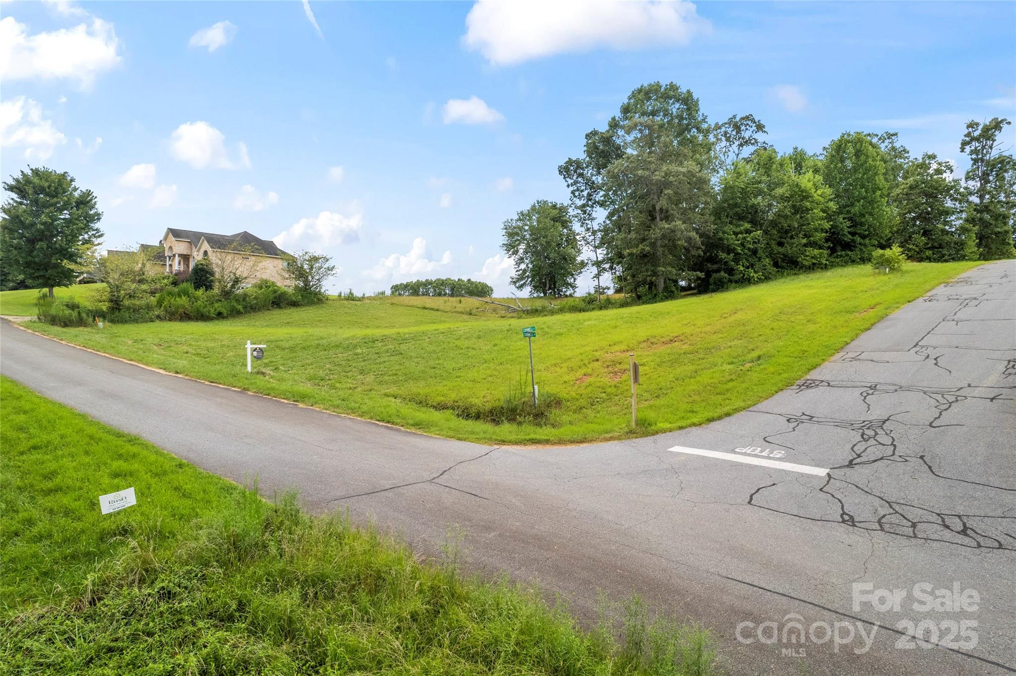 3615 Cornwell Court, Unit 149 Morganton, NC 28655 - Photo 4 of 20 a view of a golf course with a lake