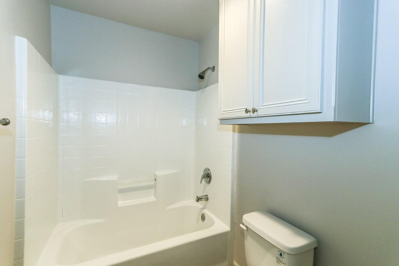 3811 133rd Street Lubbock, TX 79423 - Photo 7 of 12 a bathroom with a bathtub and a toilet