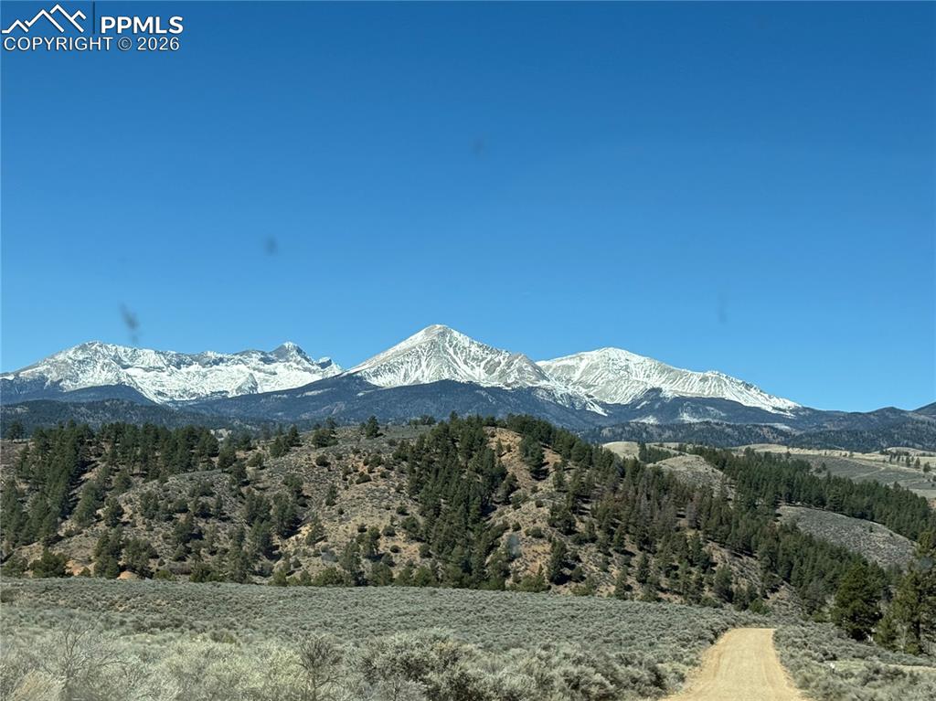 450 Schierl Road Fort Garland, CO 81133 - Photo 8 of 40 a view of a mountain with a outdoor space