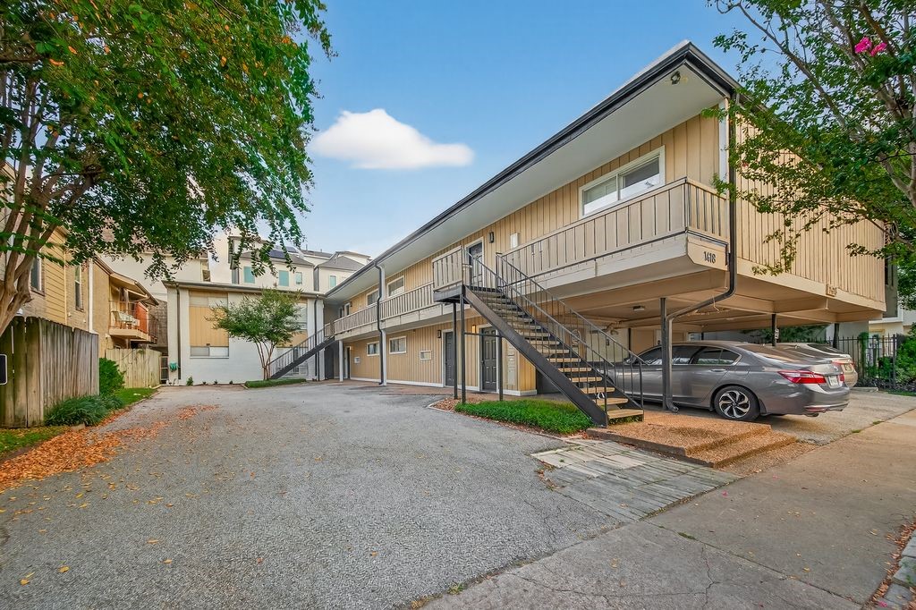 1418 Vermont Street, Unit 3 Houston, TX 77006 - Photo 14 of 14 a car parked in front of a house