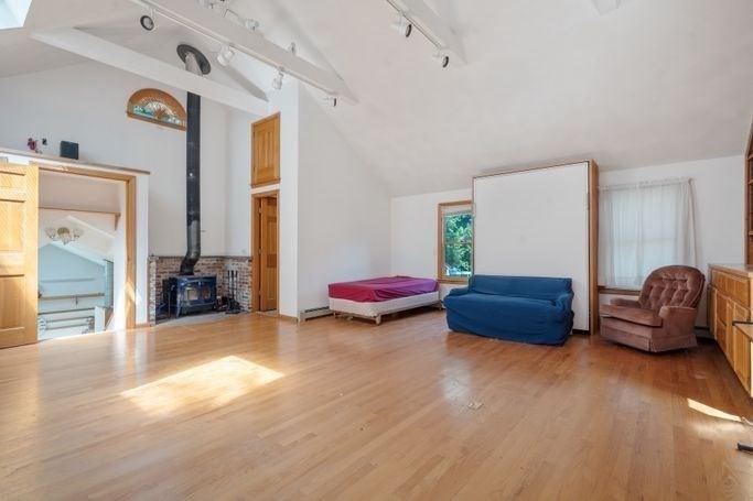 17 Everett Street Sherborn, MA 01770 - Photo 11 of 22 a living room with furniture and wooden floor