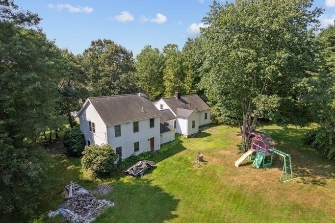 17 Everett Street Sherborn, MA 01770 - Photo 14 of 22 an aerial view of a house with swimming pool and garden