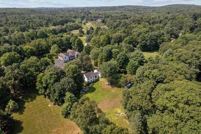 17 Everett Street Sherborn, MA 01770 - Photo 2 of 22 a view of a lake with a forest