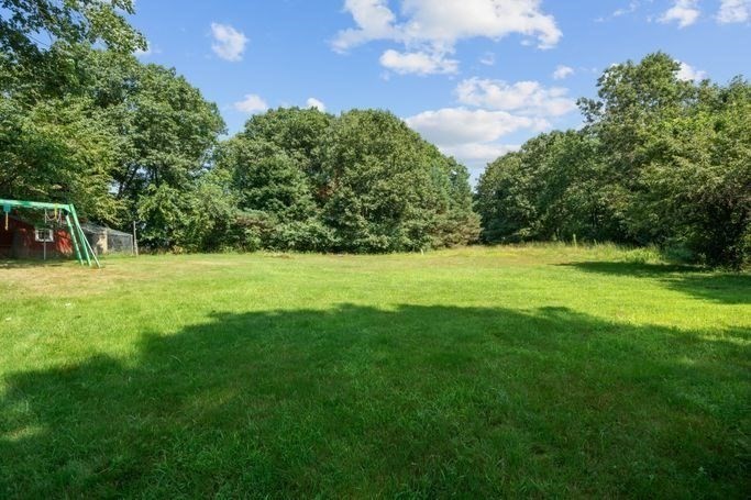 17 Everett Street Sherborn, MA 01770 - Photo 3 of 22 a view of a garden