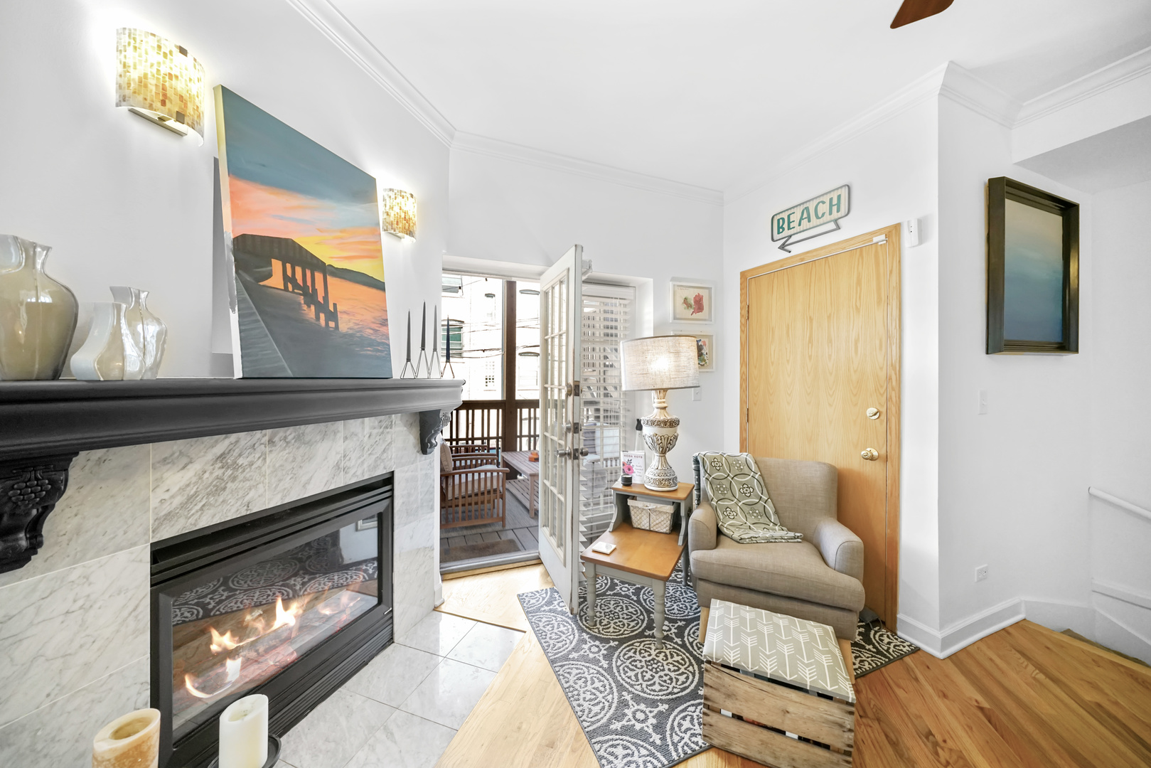 712 West Roscoe Street, Unit 3D Chicago, IL 60657 - Photo 8 of 23 a living room with furniture and a fireplace
