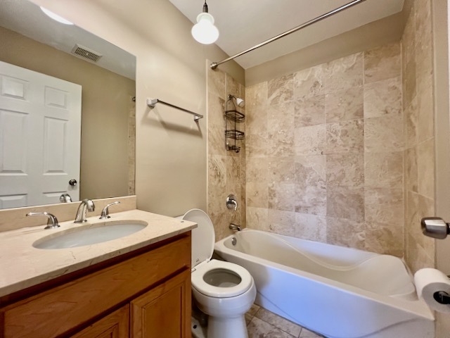 1415 West Lunt Avenue, Unit 304 Chicago, IL 60626 - Photo 9 of 14 a bathroom with a sink toilet and shower
