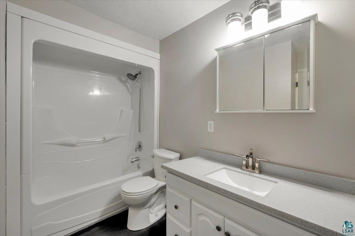 1146 Two Harbors Road Two Harbors, MN 55616 - Photo 16 of 39 Full bath with vanity and shower combination
