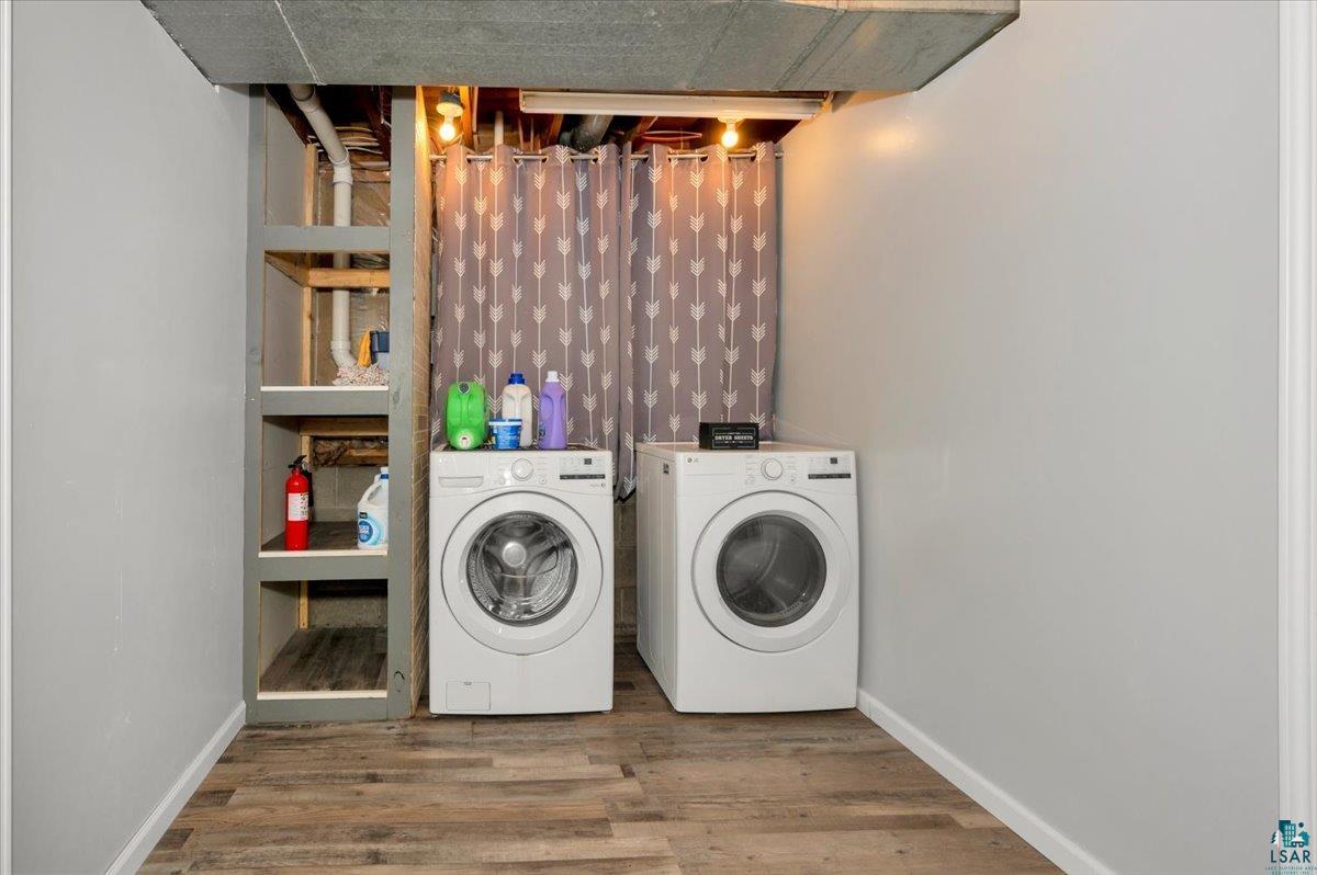 1146 Two Harbors Road Two Harbors, MN 55616 - Photo 23 of 39 Laundry room with washing machine and dryer and wood finished floors