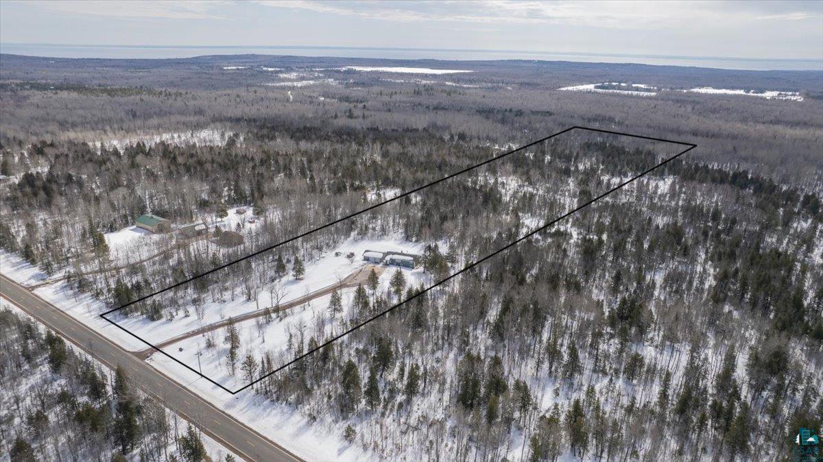 1146 Two Harbors Road Two Harbors, MN 55616 - Photo 34 of 39 Aerial overview of property's location featuring a heavily wooded area and property boundaries highlighted