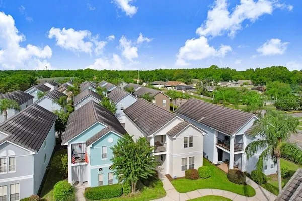a aerial view of a house with a big yard