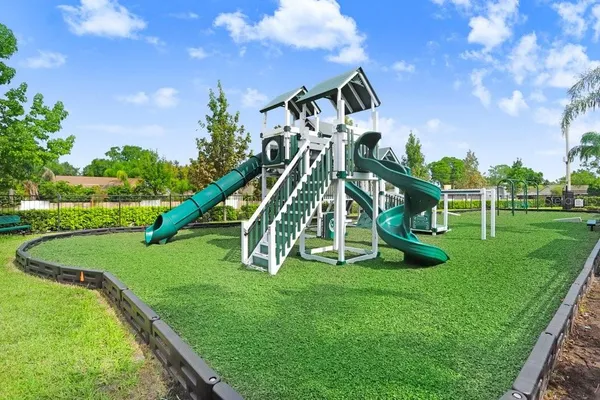a view of a park with a slide