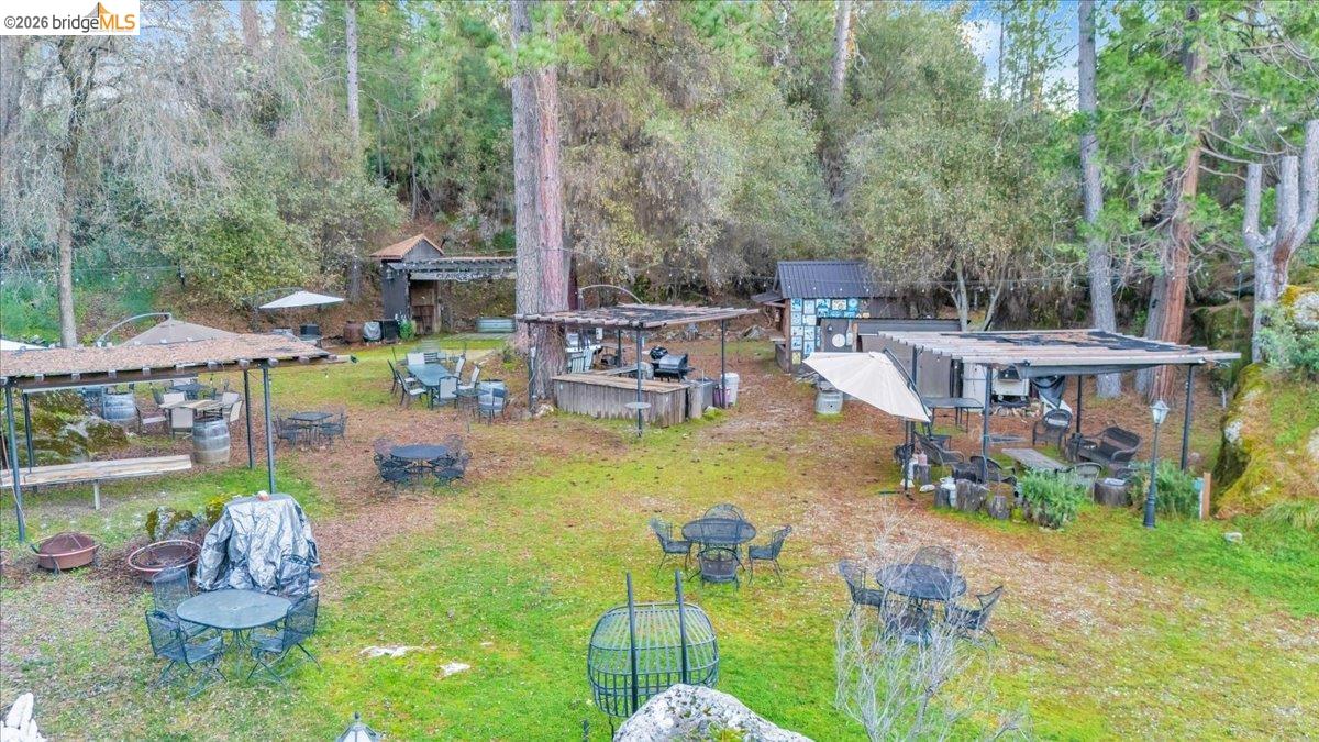 22389 Parrotts Ferry Road Columbia, CA 95310 - Photo 13 of 60 Bird's eye view of a tree filled landscape