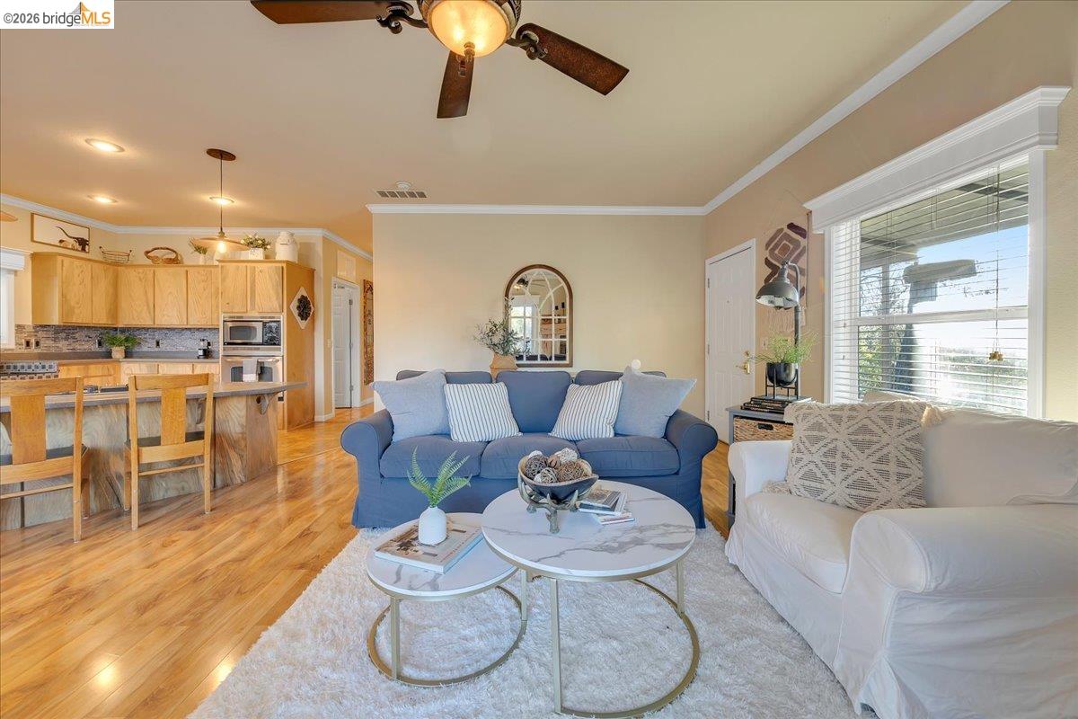 22389 Parrotts Ferry Road Columbia, CA 95310 - Photo 38 of 60 a living room with furniture and a large window