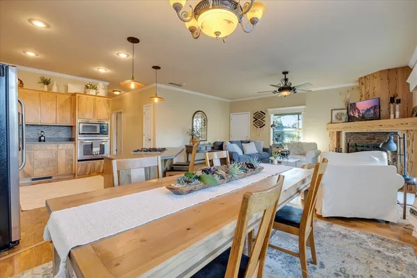 a view of a living room and kitchen