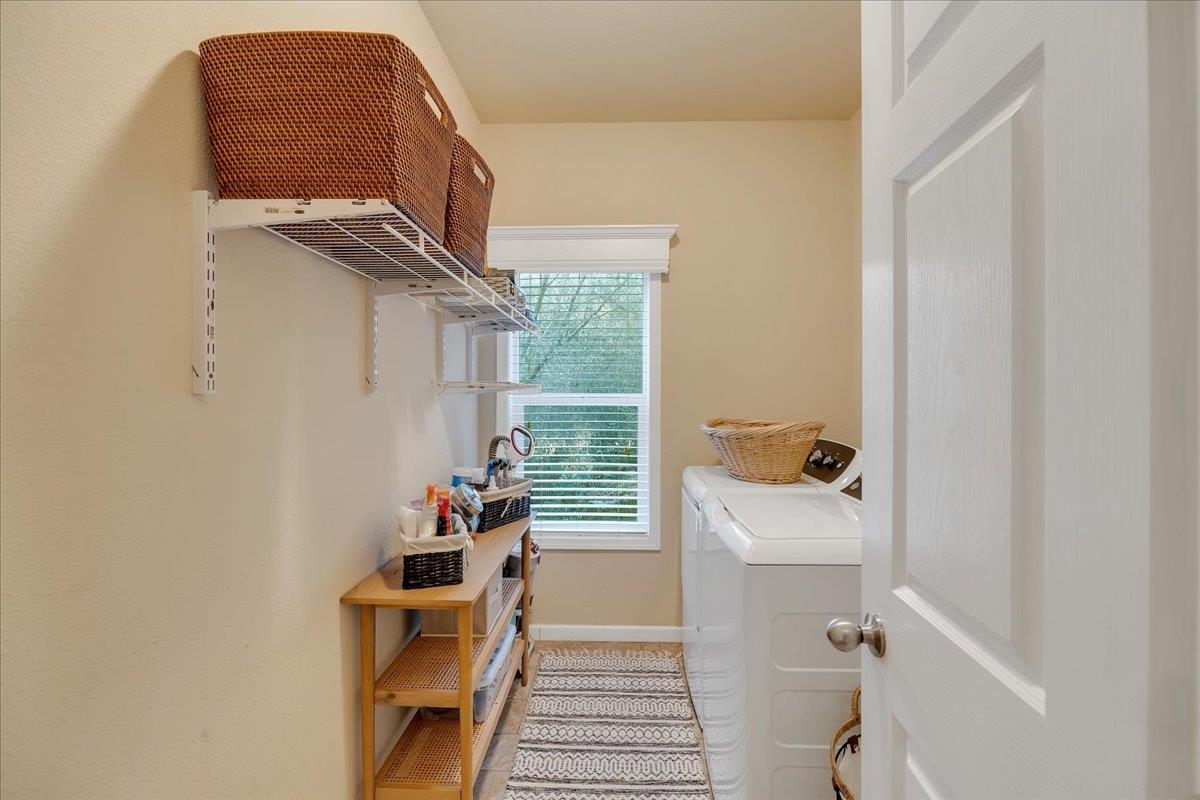 22389 Parrotts Ferry Road Columbia, CA 95310 - Photo 50 of 60 Washroom with separate washer and dryer and baseboards