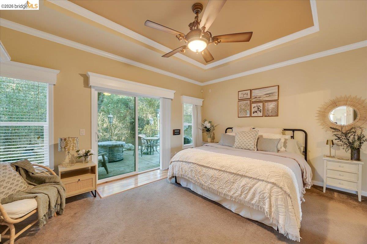 22389 Parrotts Ferry Road Columbia, CA 95310 - Photo 55 of 60 a bedroom with a bed couch and window
