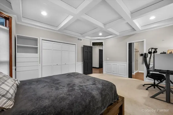 a spacious bathroom with a double vanity sink mirror and double
