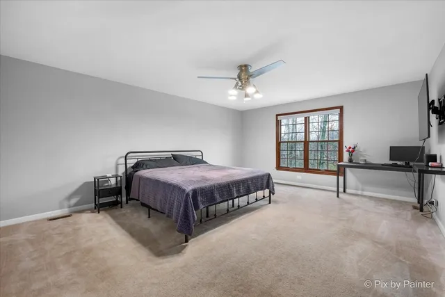 a kitchen with granite countertop stainless steel appliances wooden cabinets a sink and a stove