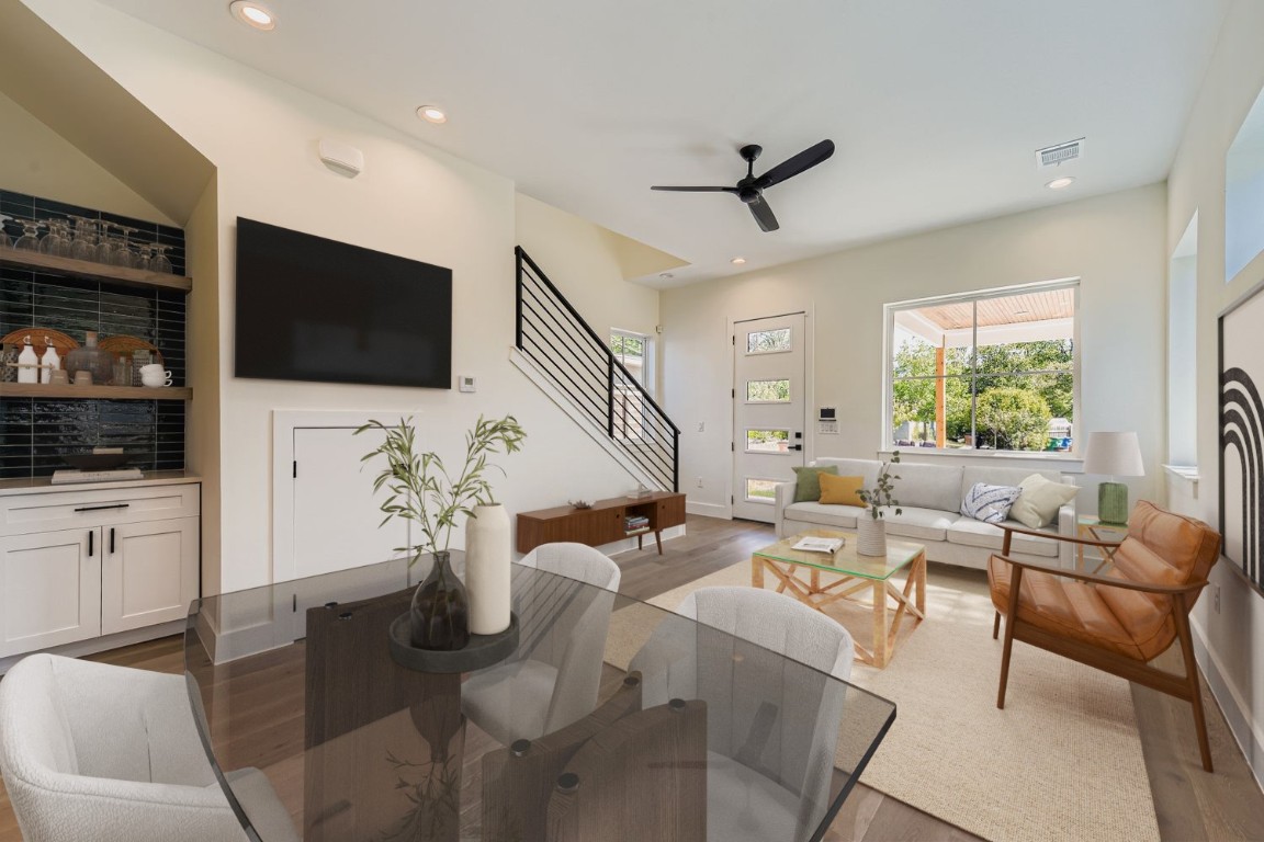 4712 South Forest Drive Austin, TX 78745 - Photo 1 of 27 a living room with furniture a flat screen tv and a window