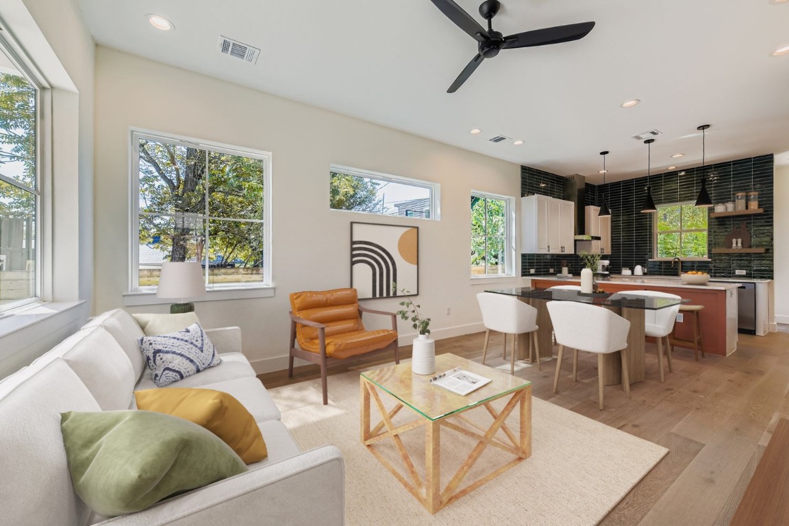 4712 South Forest Drive Austin, TX 78745 - Photo 13 of 27 a living room with fireplace furniture and a large window
