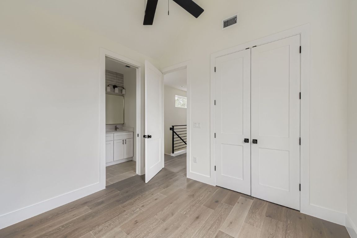 4712 South Forest Drive Austin, TX 78745 - Photo 19 of 27 a view of empty room with wooden floor