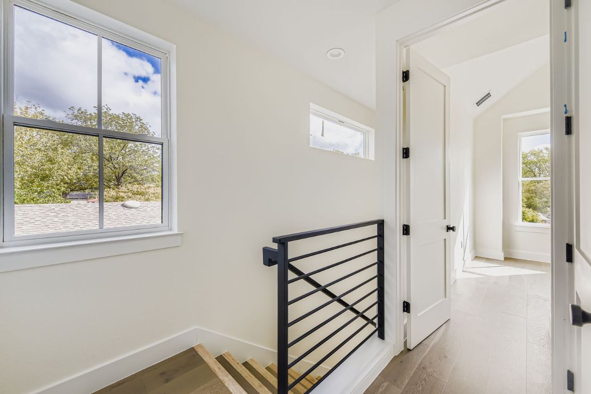 4712 South Forest Drive Austin, TX 78745 - Photo 25 of 27 a view of a hallway with wooden floor and entryway
