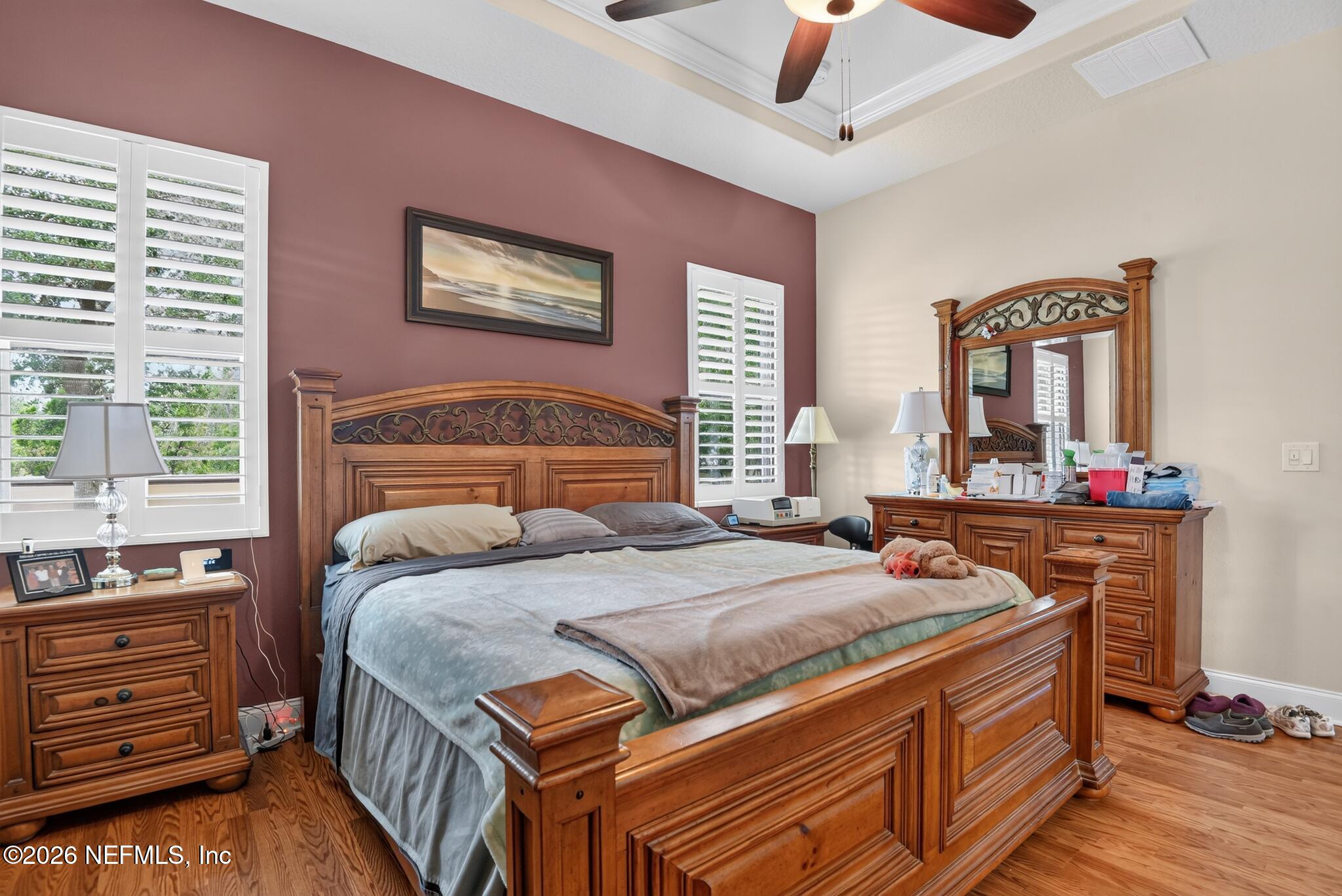 110 Vía Roma Ormond Beach, FL 32174 - Photo 41 of 43 a bedroom with a bed and a dresser