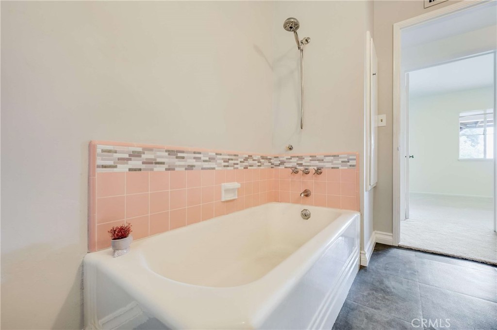 3665 Landfair Road Pasadena, CA 91107 - Photo 22 of 32 a bathroom with bathtub and shower