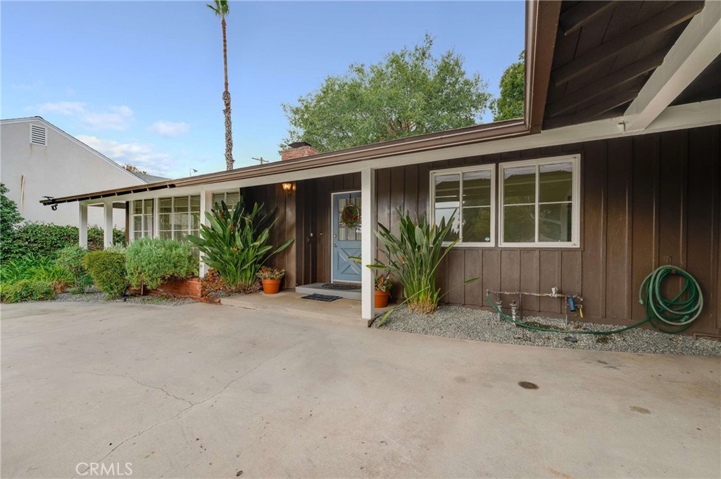 3665 Landfair Road Pasadena, CA 91107 - Photo 4 of 32 a view of a house with porch and potted plants