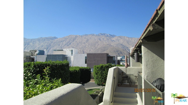 a view of a patio in backyard