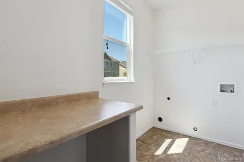 a utility room with a sink