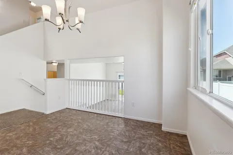 a view of a livingroom with a staircase