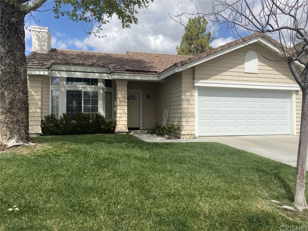 23449 Riversbridge Way Valencia, CA 91354 - Photo 1 of 1 a view of a house with garden