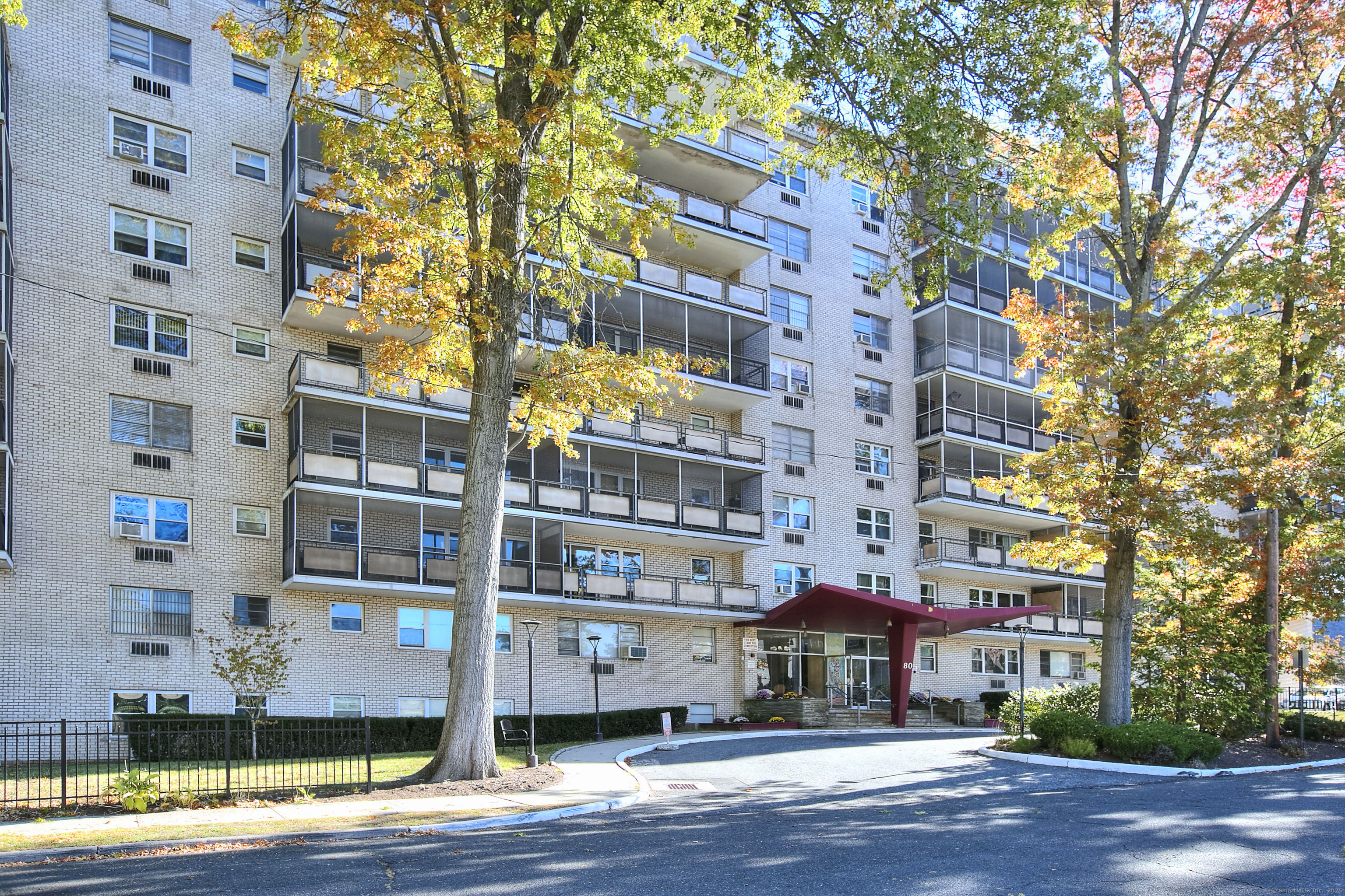 a front view of a building with street view