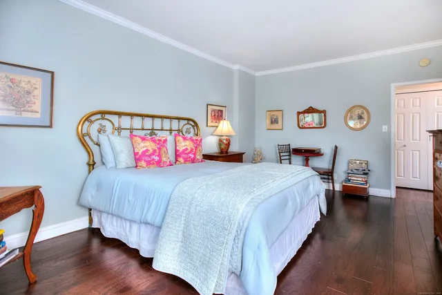 a bathroom with a sink a mirror and a shower