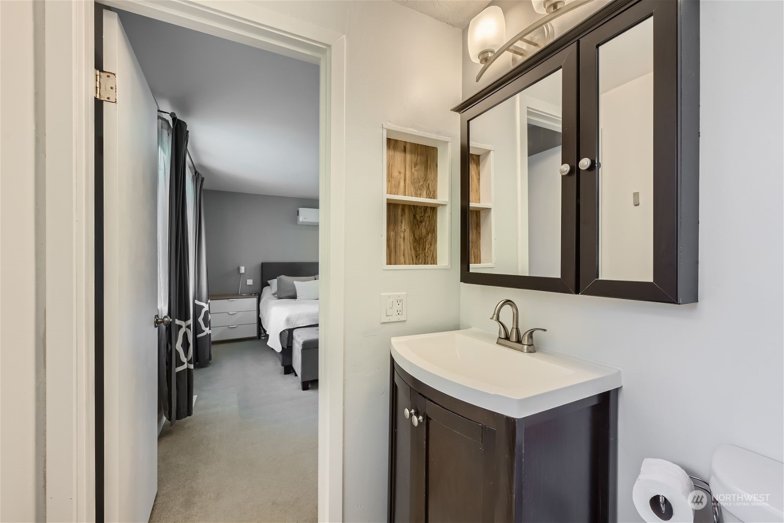 2622 168th Street Southeast Bothell, WA 98012 - Photo 16 of 29 a en suite bathroom with a sink and a mirror