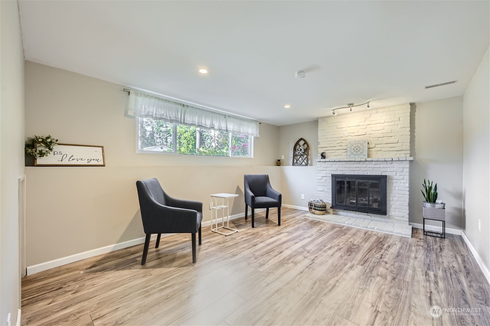 2622 168th Street Southeast Bothell, WA 98012 - Photo 21 of 29 a view of a livingroom with furniture and a fireplace