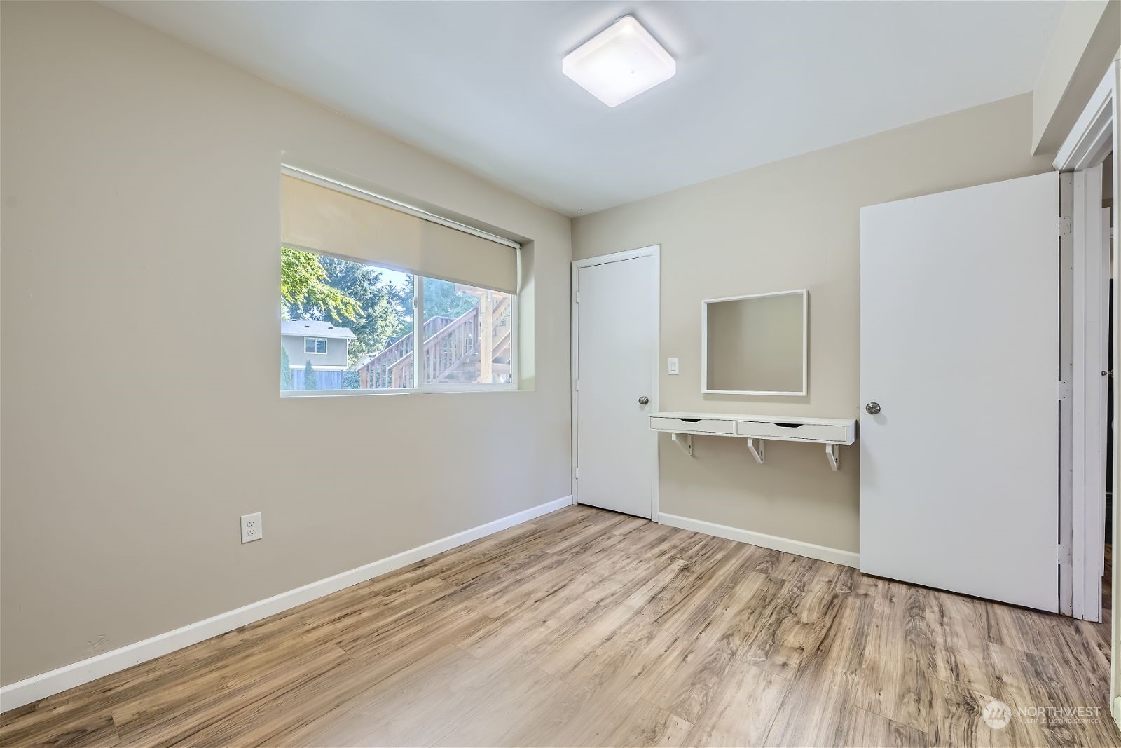2622 168th Street Southeast Bothell, WA 98012 - Photo 22 of 29 a view of empty room with wooden floor and fan