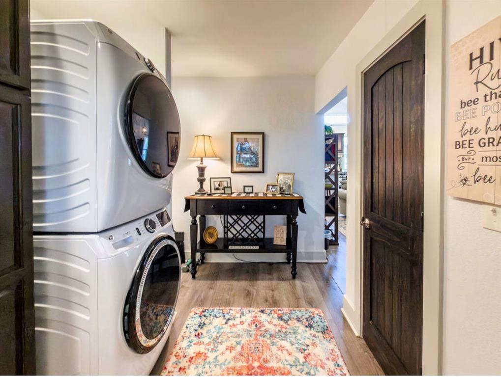 14275 Gholson Road Gholson, TX 76705 - Photo 11 of 22 Compact laundry area featuring stacked front-load appliances