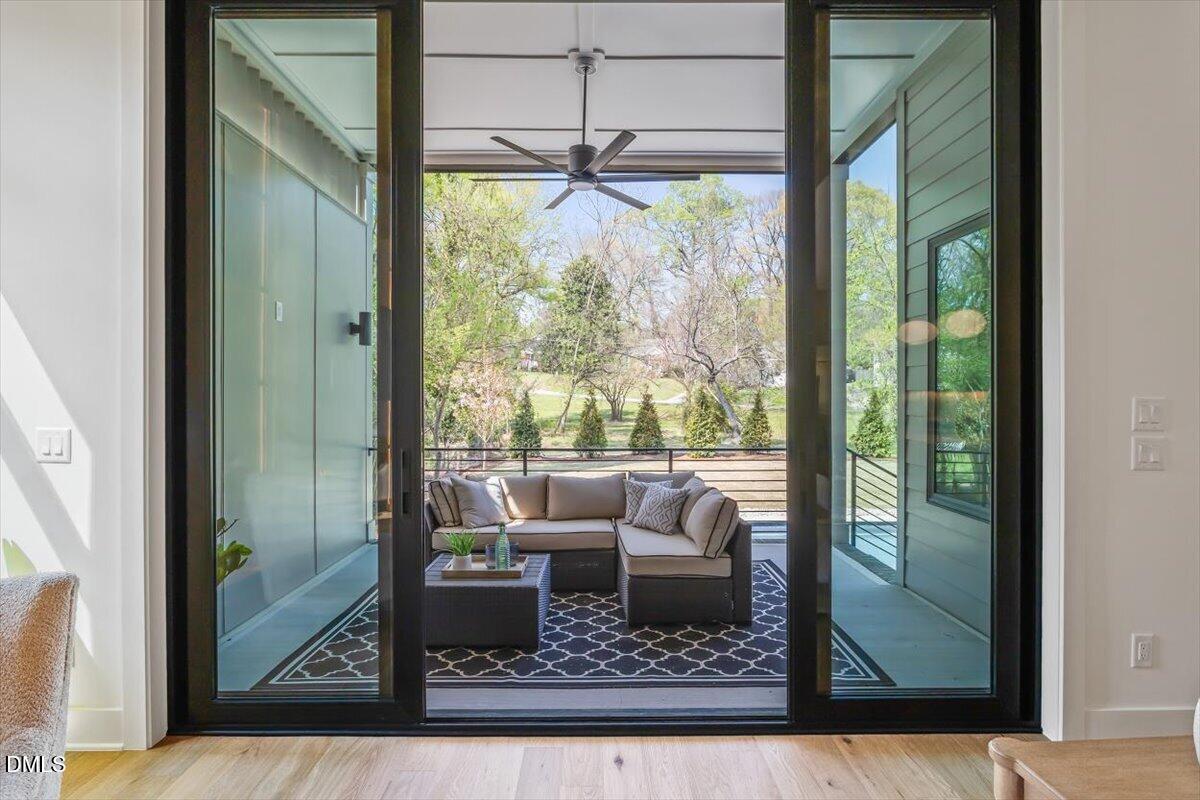 1213 Brookside Drive Raleigh, NC 27604 - Photo 24 of 50 a living room with couch and outdoor view