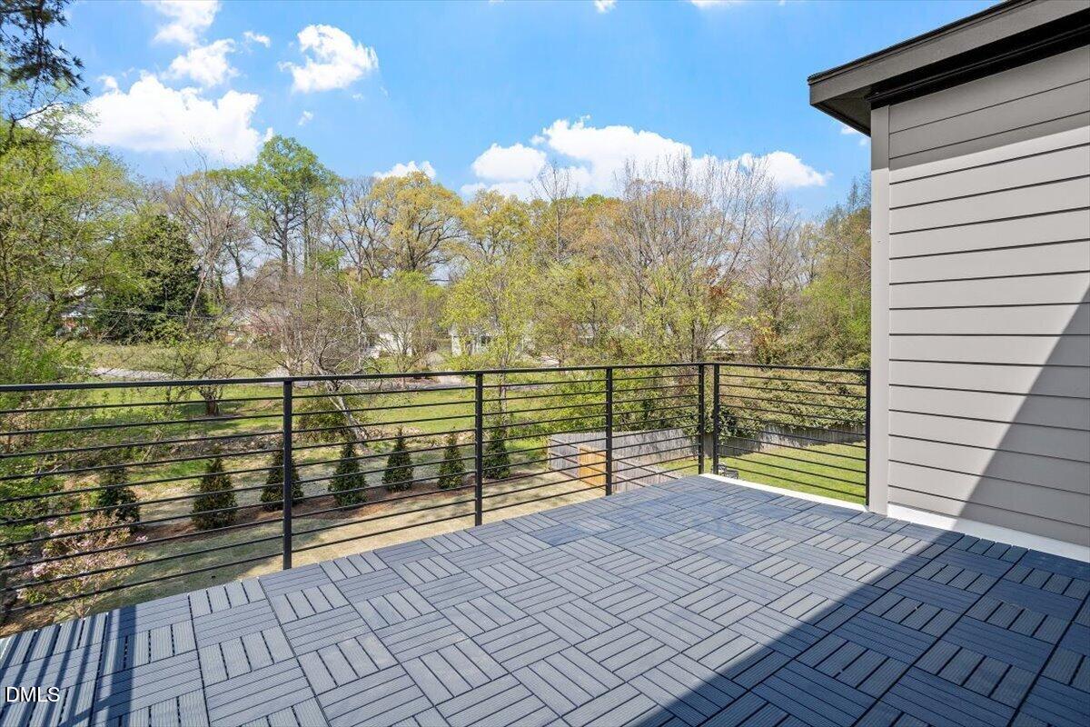 1213 Brookside Drive Raleigh, NC 27604 - Photo 45 of 50 a view of a balcony with water view