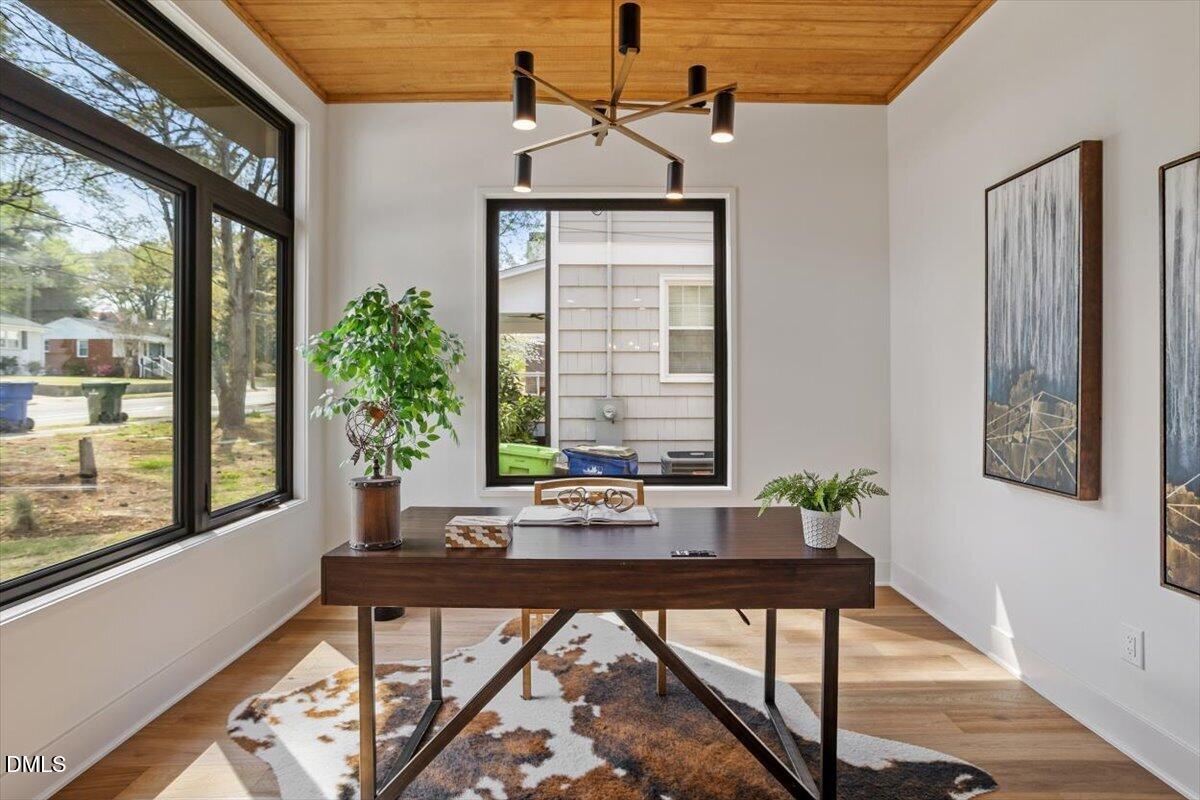 1213 Brookside Drive Raleigh, NC 27604 - Photo 9 of 50 a view of a room with a window and furniture