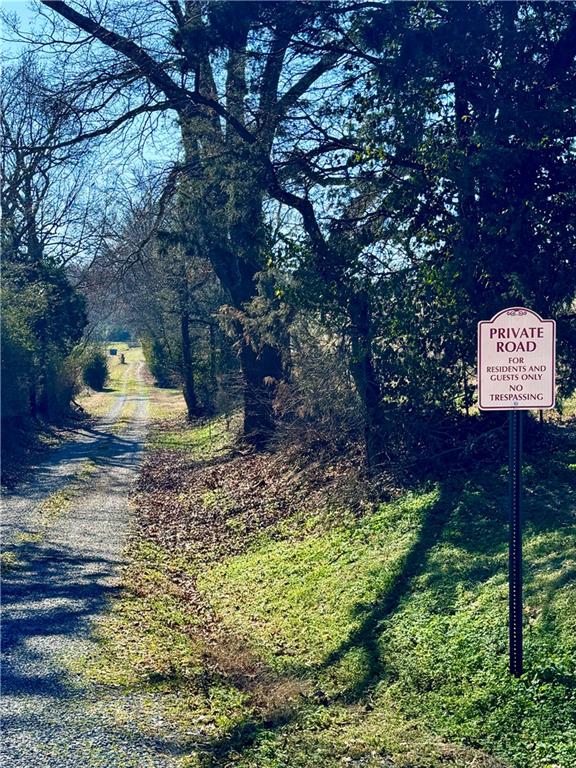 2113 Union Grove Church Road Southeast Adairsville, GA 30103 - Photo 31 of 36 a sign that is sitting in the middle of garden