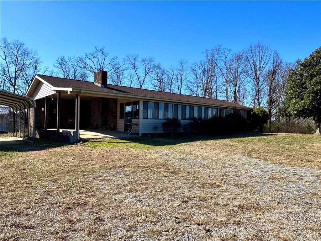 2113 Union Grove Church Road Southeast Adairsville, GA 30103 - Photo 32 of 36 a view of a house with a yard