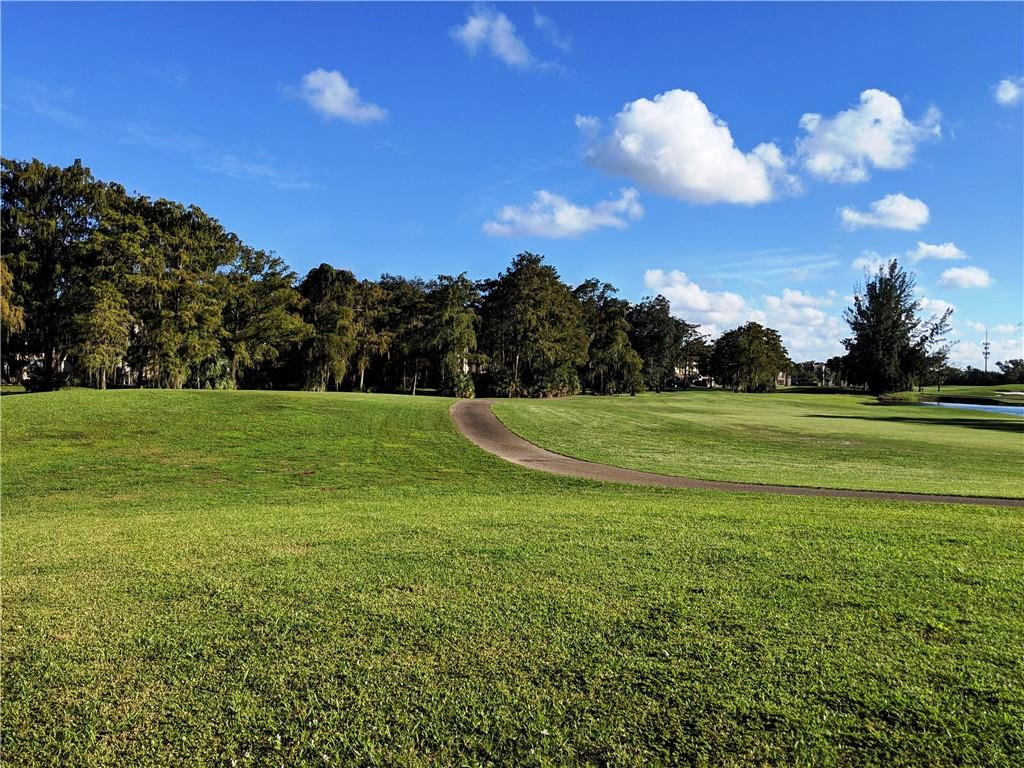 7650 West McNab Road, Unit 310 Tamarac, FL 33321 - Photo 24 of 30 a view of a golf course