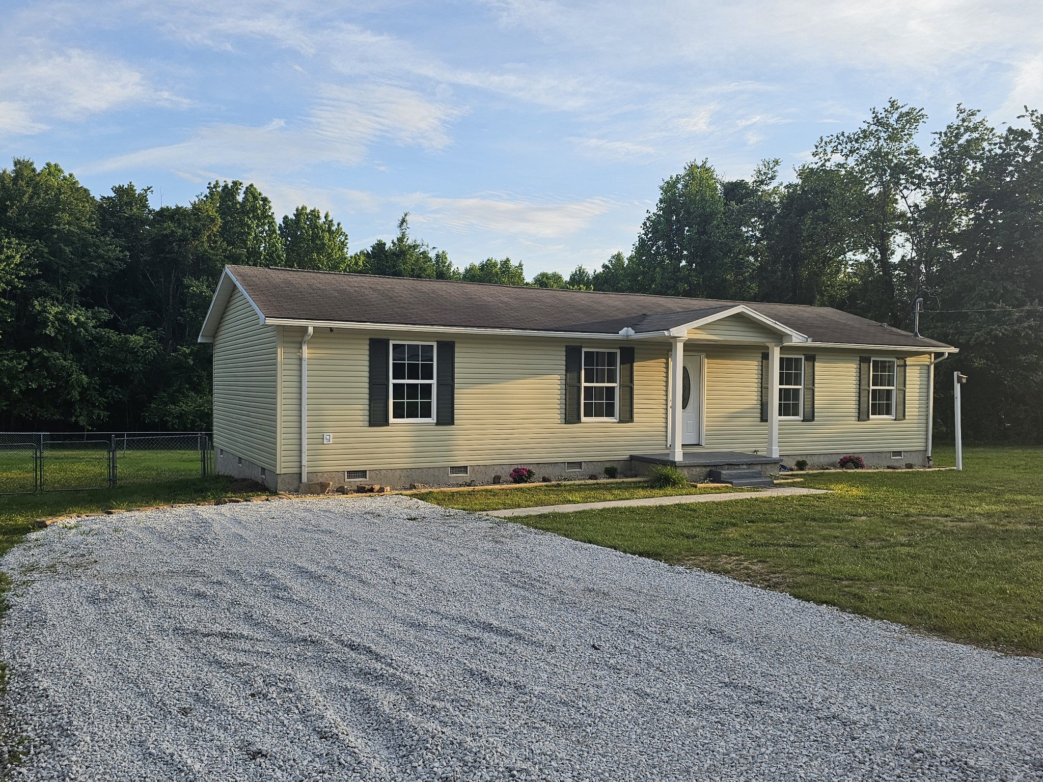 362 Forest Point Road Monteagle, TN 37356 - Photo 7 of 42 a front view of a house with a yard