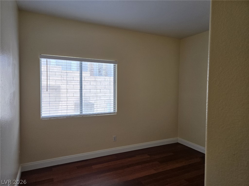 8417 San Ramon Drive Las Vegas, NV 89147 - Photo 22 of 33 Rich hardwood floors create a welcoming atmosphere in this adaptable private space.