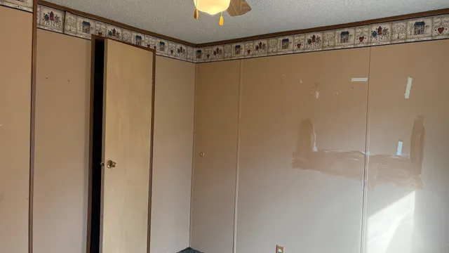 a bathroom with a shower and a mirror